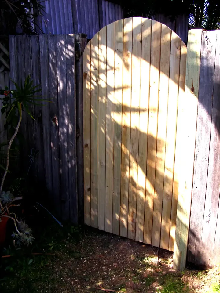 new timber gate built for a garden fence